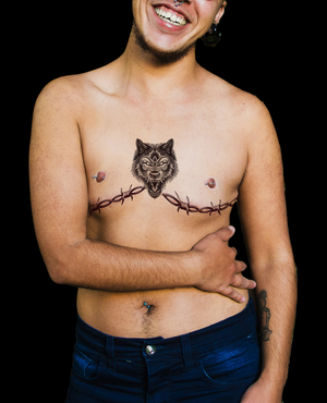 Fierte Wolf and Barbed Wire Gender-Affirming Top Surgery Tattoo